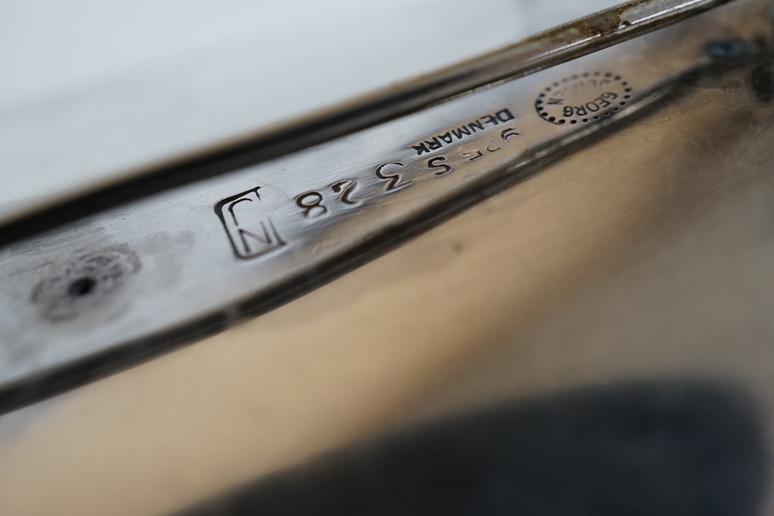 An Elizabeth II Nanna & Jorgen Ditzel for Georg Jensen silver brooch, design number 328, import marks for Georg Jensen Ltd, London, 1965, 51mm, with Jensen box.